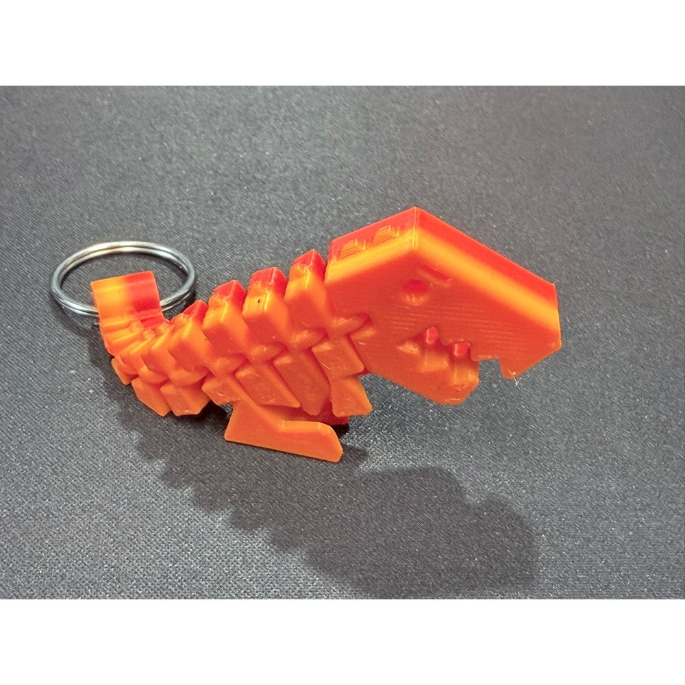 3D Printed Articulated T-Rex Keychain Orange Red Gradient Flexible Dinosaur Toy - Picture 2 of 4